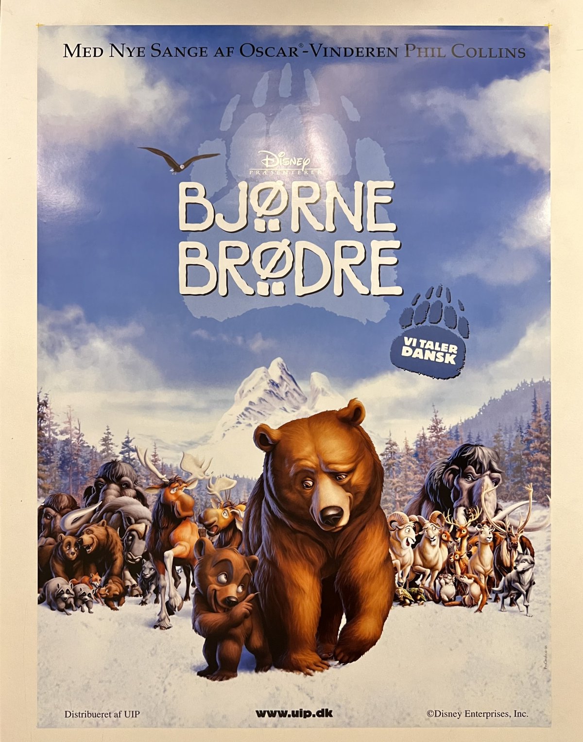 a big bear smiles down at a baby bear. in the background are other arctic animals e.g. mammoths, moose, wolves. they are all walking towards the camera happily, in a snowy mountainous landscape.